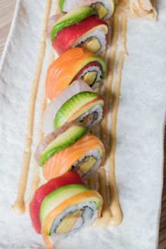 sushi rolls with avocado, tomato and cucumber