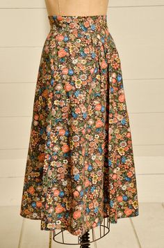 "1970s Prairie Skirt Brown & Rust Floral Bouquet Print Western Dress 70s high waisted prairie skirt. In good condition, no damage to note. Two side pockets with hidden zipper in the back. No tag or size marked. Fits like a Small, but please refer to measurements. Measurements waist: 25\" length: 29\"" Vintage Dress With Gathered Flowy Skirt, Vintage Dresses With Lined Relaxed Skirt, Vintage Long Dress With Lined Skirt, Vintage Dress With Lined Relaxed Skirt, Vintage Long Skirt Dress With Lined Skirt, Vintage Long Pleated Dress, Vintage Long Pleated Skirt Dress, Vintage Cotton Dresses With Lined Skirt, Vintage Cotton Maxi Skirt