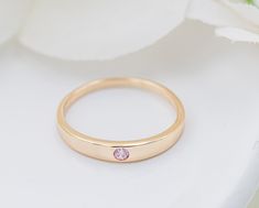 14K Gold-plated baby ring featuring a simple band and a pink CZ stone for October Birthstone. This ring is made with sterling silver and plated with 14K gold plating. This makes a special keepsake baby gift or wonderful birthday gifts for toddlers, kids, children. Great pinky ring as well and comes in a beautiful black velvet heart-shaped box. Ring Sizing: https://cherishedmomentsshop.com/pages/sizing-charts Gifts For Toddlers, Baby Ring, Gold Pinky Ring, Keepsake Baby Gifts, Baby Rings, Simple Band, Kids Rings, Velvet Heart, Box Ring