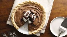 a chocolate pie is sitting on a table