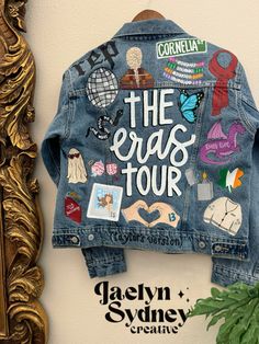 Handpainted custom eras tour jacket Eras Tour Outfits Jacket, Custom Eras Tour Outfit, Taylor Swift Jacket Ideas, Taylor Swift Custom Jacket, Taylor Swift Jacket Diy, Eras Tour Jean Jacket, Eras Tour Denim Jacket, Custom Jean Jacket Ideas, Taylor Swift Denim Jacket