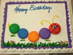 a birthday cake decorated with the very hungry caterpillar