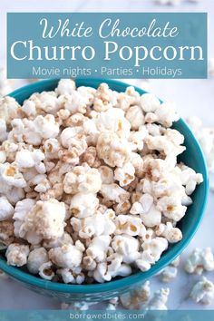 white chocolate churro popcorn in a blue bowl with text overlay that reads, white chocolate churro popcorn movie nights parties holidays