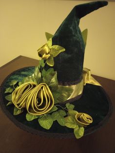 Hand Sewn Ladies Velvet Celtic Green Fairy Wizard Witch Hat with Silk Roses Fantasy Renfaire. The velvet green hat is satin lined to protect your hair and has cotton lace, green and gold ribbon, green leaves and flowers and a feather.  Perfect for renfaire, party, halloween, or other events. Fairy Wizard, Fairy Hat, Chicago Bulls Snapback Hat, Celtic Green, Blue Bucket Hat, Straw Hat Beach, Green Fairy, Vintage Patagonia, Green Hat