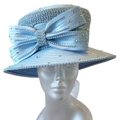 This Gorgeous Designer Couture Satin Ribbon Church, Wedding, Or Special Occasion Hat Is “Over The Top” Adorned With Rows And Rows Of Crystal Rhinestones. The Trimming Is Made Up Of A Double Satin Ribbon Bow And Covered With Loose Crystal Stones. A 4-5 Inch Square Crown And A 4-5 Inch Down-Turned Brim. Available In: Turquoise, Orange, Lt. Blue, And Fuschia. An Adjustable Sweatband Inside The Crown To Fit Most Head Sizes Fitted Hats For Mother Of The Bride, Spring, Blue Church Hats For Spring, Blue Spring Hats For Church, Spring Curved Brim Hat For Mother Of The Bride, Fitted Light Blue Hat For Summer, Blue Hats For Church In Spring, Wide Brim Hats For Mother Of The Bride, Blue Spring Church Hats, Fitted Light Blue Hat For Royal Ascot