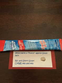 a candy bar sitting on top of a wooden table