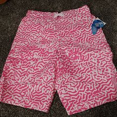 Pink And White Animal Print. Upf 50. Magic Print...Glow In The Dark Material. Mesh Lined With Drawstring Waist. Back Pocket Velcro Shut. Cheap Pink Swim Trunks, Playful Pink Swim Trunks For Beach, Pink Short-length Swim Trunks For Sports, Pink Upf 50+ Sports Swimwear, Cheap Pink Short-length Swim Trunks, Pink Swim Trunks With Built-in Shorts, Dark Material, Kids Swimming, Swim Trunks