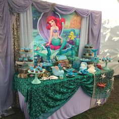 the little mermaid birthday party table is set up