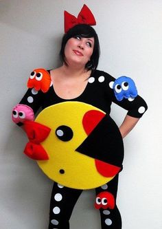 a woman is dressed up as a pikachu and pacman with polka dots