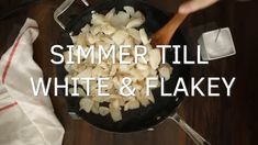 someone cooking food in a skillet with the words summer til white and flakey