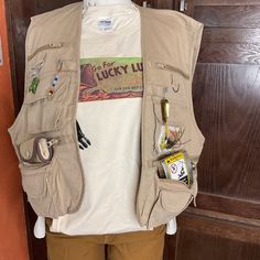 Great suprise for your favorite Angler!.  New old stock fishing vest and tee shirt.  Sizes are displayed on tags.  See photos.  I added a fun collection of vintage things.   Vest tag reads XL Tee Shirt reads 2XL Funky Clothes, Fishing Vest, Crystal River, Funky Outfits, Vintage Things, Shirt Collection, Khaki Color, Fly Fishing, Tee Shirt