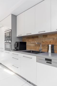 modern kitchen with white cabinets and stainless steel appliances - stock photo - images in gallery