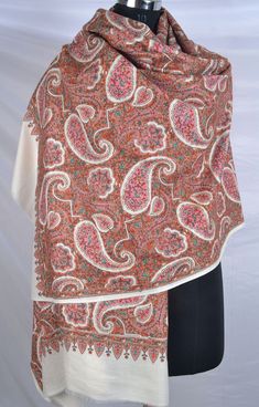 This Embroidered Pashmina Shawl is a luxurious and elegant accessory that can add a touch of sophistication to any outfit. The intricate paisley embroidery adds a beautiful and intricate detail to the shawl, making it a perfect accessory for formal events or even everyday wear. This embroidered pashmina shawl is a must-have accessory for anyone looking to add a touch of luxury and elegance to their wardrobe. The micro embroidery of this shawl mesmerizes the owner and any person wearing this shaw White Festive Pashmina Shawl, White Pashmina Shawl For Festive Occasions, Wedding Jamawar Embroidered Fabric, Embroidered White Pashmina Dupatta, White Pashmina Dupatta Shawl, Festive White Pashmina Shawl, White Embroidered Pashmina Shawl In Traditional Drape, Festive White Pashmina Dupatta, White Pashmina Dupatta For Eid