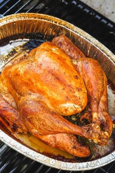 the best grilled turkey recipe is on the grill and ready to be cooked in the oven