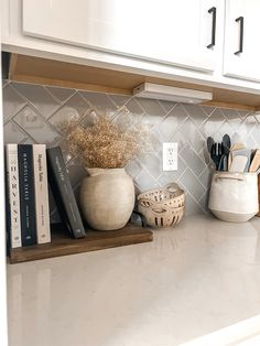 the kitchen counter is clean and ready to be used as a shelf for cooking utensils