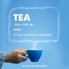 a person holding a coffee cup in their left hand with the words tea above it