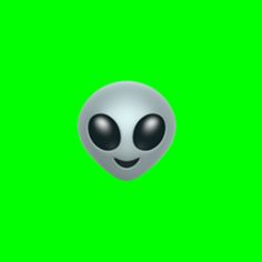 an alien head on a green screen with black eyes and large, round - shaped ears