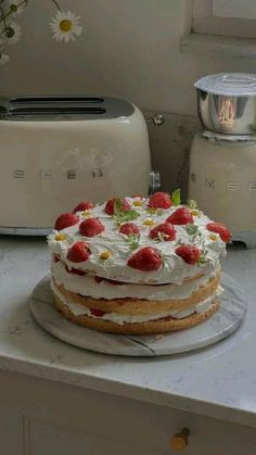 a cake sitting on top of a white counter