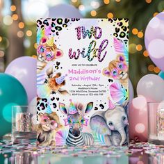 an animal themed birthday party with balloons and confetti