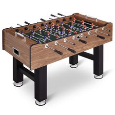 the foosball table is made from wood and metal