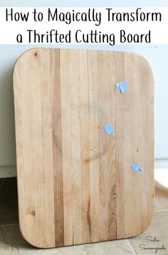 a wooden cutting board with the words how to magician transform a thrift cutting board