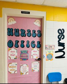 a pink door with the words nurses office painted on it in front of a classroom wall