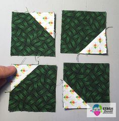 four pieces of green fabric are being sewn together to make a quilted triangle