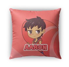 an orange pillow with the character aaron on it's front and back sides are shown