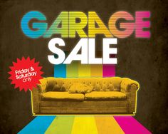 a couch sitting on top of a rainbow colored floor next to a wall with the words garage sale written across it