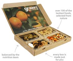 an open box filled with different types of nuts and other food items, labeled in the words grazi