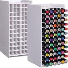 the wine rack is filled with many different colors and sizes, including black, white, red, green, blue, yellow