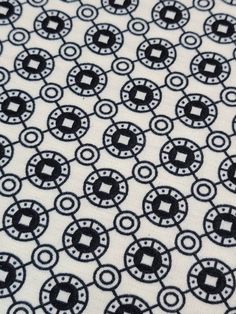 black and white fabric with circles on it