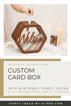 a wooden card box with the word custom on it and an image of a person holding a