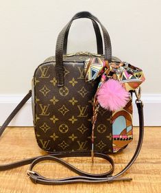 100% AUTHENTIC BEAUTIFUL Louis Vuitton Spontini 2-way satchel/crossbody in classic Monogram! Intended for the woman on the go, this lightweight piece is perfect for everyday use. Canvas exterior, leather straps, gold hardware. Full zip around double zip top allows for easy access to your essentials. So cute and fun! Dimensions: 9x8x4 Code: AR0083 (France,2003) Condition (all shown in pictures, price reflects) Great! (7.5/10). Please note: the crossbody strap is a new, non-branded matching leather strap. Previous owner cemented the long strap bases into place. One still shows a split but is extremely secure. The top handles have been repaired and painted brown. They still have some creases but are secure. The inside lining (referred to as “Vuittonite”) has some peeling on the very top. Seal Gold Hardware, Bags Handbags, Leather Straps, Satchel, Bag Lady, Shoe Accessories, Louis Vuitton, Women Accessories, Monogram