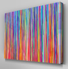 an abstract painting with multicolored lines on the wall