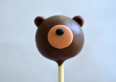 a chocolate bear lollipop on a stick