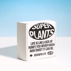 a box that has some type of plant on it's side and the words super plants written in black