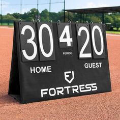 a scoreboard on a baseball field with the numbers 30, 42 and 40