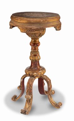 an old wooden table with carvings on the top and bottom, sitting against a white background