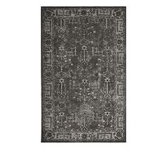 a black and white rug with an intricate design on the bottom, in front of a white background