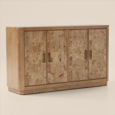 a large wooden cabinet with two doors and some corks on the front, against a white background