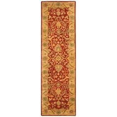 a red and yellow rug with an ornate design on the bottom, in front of a white background