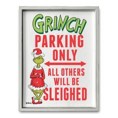 the grinch parking only sign has an arrow pointing to it's left side