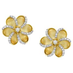 Bring a touch of springtime to your jewelry collection with these stunning Narcissus flower shaped stud earrings. Handcrafted from 14k yellow gold and adorned with shimmering diamonds, their intricate carved design captures the beauty and delicacy of these beloved flowers. These earrings are the perfect accessory to add a touch of sophistication and femininity to any outfit. 14KT:3.948g, Diamond:0.38ct Narcissus Flower, Flower Shape, Spring Time, Jewelry Earrings Studs, Jewelry Collection, Yellow Gold, Jewelry Earrings, Stud Earrings, Carving