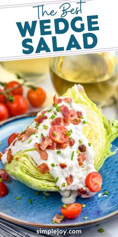 the best wedge salad with bacon, lettuce and tomatoes on a blue plate