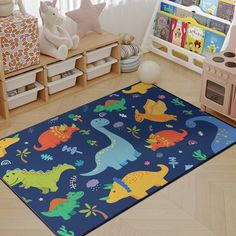 a child's play room with toys, bookshelves and rugs on the floor