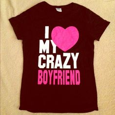 a t - shirt that says i love my crazy boyfriend with a heart on it