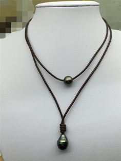 "Pearl Leather Necklace, Front pearl is tahitian pearl,one round size is 10-11mm,another is rice tahitian pearl,11-13mm big tahtiian pearl back clasp pearl is freshwater pearl. Necklace is 9'' to 21'' long, intended to be worn as a choker(normal 14''-15''). Leather is 2 mm thick. Back to Other Jewelry Section 01: \"Flameball,Edison Pearl\" Section： https://www.etsy.com/shop/WenPearls?section_id=18890242 02: \"Various Baroque Pearl,Keshi Pearl\" Section: https://www.etsy.com/shop/WenPearls?sectio Diy Gelang, Pearl Leather Necklace, Leather Pearl Jewelry, Knot Jewelry, Leather Pearl Necklace, Circle Jewelry, Beads Craft Jewelry, Leather Choker Necklace, Cord Jewelry