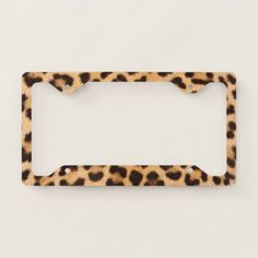 an animal print license plate frame on a white background with clipping area for text