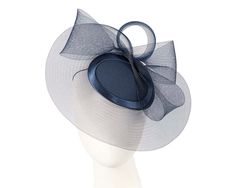 This gorgeous navy headpiece from our beautiful range of cocktail hats, headpieces and special occasion hats is custom made from luxurious fabric with crinoline brim and with comb for comfortable wearing. This hat is ideal for those special occasions such as weddings, Melbourne Cup and Ascot. This cocktail hat is made to order and we can make it in any colour on request. Just tell us the colour you like. We can also make the hat from your fabric.  Made in Australia  Custom made to match your out Navy Formal Hat With Curved Brim, Navy Curved Brim Formal Hat, Elegant Navy Wide Brim Hat, Elegant Navy Hat With Curved Brim, Elegant Navy Hats With Curved Brim, Navy Party Hat For Kentucky Derby, Elegant Navy Hat For Evening, Fitted Navy Hat For Kentucky Derby, Navy Hat For Kentucky Derby Party